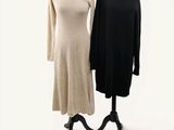 two dresses on a mannequin stand on a white background
