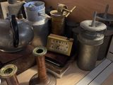 many different types of pots and pans on the counter