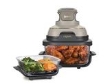 an image of a air fryer with a bowl of chicken and broccoli