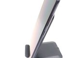 a close up of a cell phone on a stand