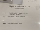 un document sur lequel figure la photo d'une paire de boucles d'oreilles