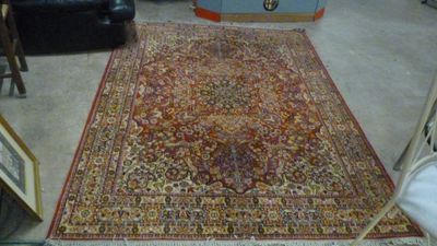 a large oriental rug on the floor in a living room