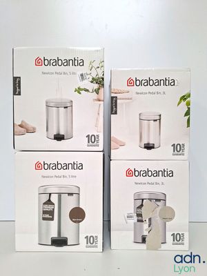 two boxes of brabantia coffee maker sitting on a table