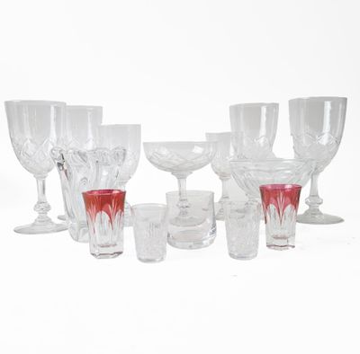 a lot of wine glasses that are sitting on a table