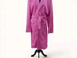 the robe is pink and has a pattern of flowers on it