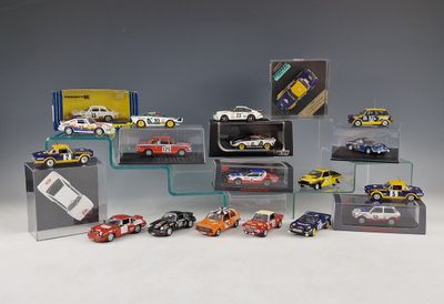 a lot of toy cars on display in a display case