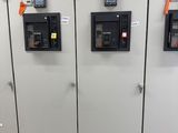 a bunch of electrical equipment that are on the wall