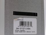 the back of a gray box with a barcode on it