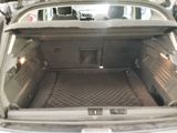 a trunk of a car with the back door open