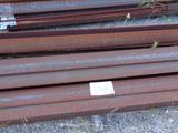 a lot of steel bars stacked on top of each other