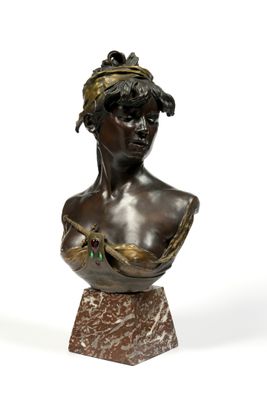 an image of a bronze bust of a woman on a marble base