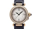 Montre Cartier pour femme en or rose 18 carats et diamants