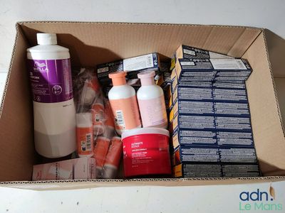 a cardboard box with a lot of different items inside of it