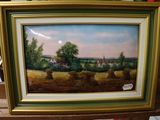 a picture of a painting of a farm scene in a frame