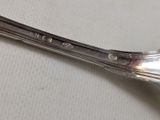 a spoon that is sitting on a table