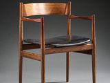 an image of a wooden chair with a black leather seat