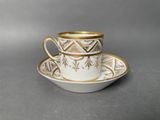 an image of a coffee cup and saucer on a saucer
