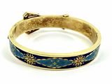 an image of a blue and gold bracelet with flowers on it