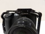 a close up of a camera with a lens attached to it