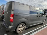 a van that is parked on the side of the road