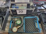 une boîte contenant un manomètre et un manomètre à l'intérieur