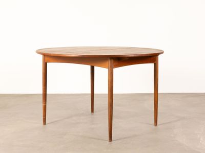 a round wooden table with two legs and a wooden top