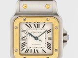 une photo d'une montre Cartier avec un cadran jaune et noir