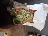 a paper bag that has a picture of a house on it