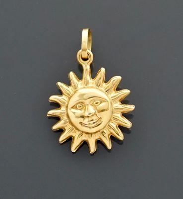 Pendentif en or jaune 18K 750 millièmes présentant un visage…
