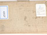 a brown box with a blue label on it and a sticker on it