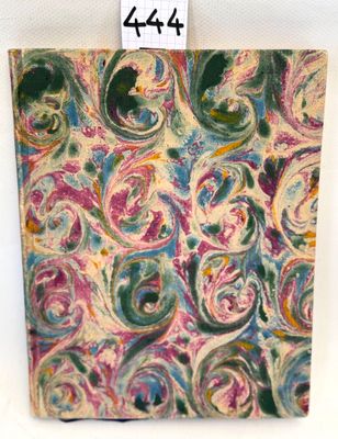 a close up of a painting on a white surface with a tag