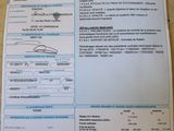 une photo d'un document sur lequel figure la photo d'une personne