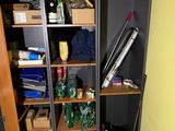 a closet with a lot of boxes on the shelves
