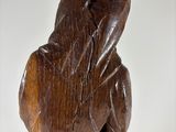 statue of a woman with a hood over her head