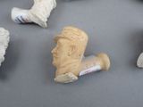 a group of clay figurines that are on a table