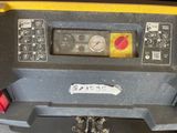 a close up of a machine with a lot of buttons on it