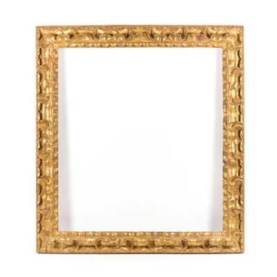 a gold frame with a decorative pattern on it