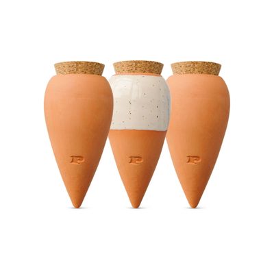three orange vases with cork tops on a white background