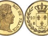 une pièce souveraine en or surmontée d'une couronne