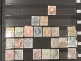 an open book with a bunch of stamps on it