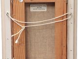 an image of a picture frame with a label on it