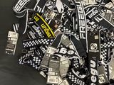 a pile of lanyards that are on a table