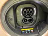 a picture of a car ' s electrical plug in the center of the vehicle