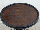a small table with a decorative design on it