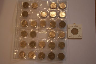 a lot of coins that are in a plastic bag