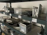 many shelves with various items on them in a room