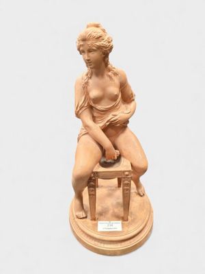 D'après CLODION : "Femme à sa toilette".