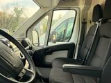 a view of the inside of a van from the driver ' s seat