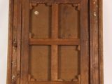 an old wooden window with a glass pane in the middle