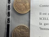 un petit bout de papier sur lequel est dessinée une pièce d'or